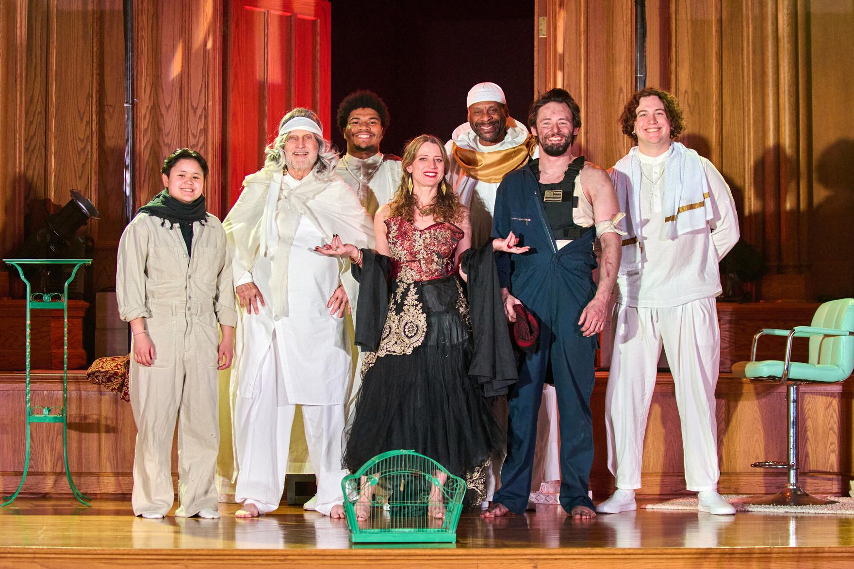 The full cast of The Persians onstage at curtain call